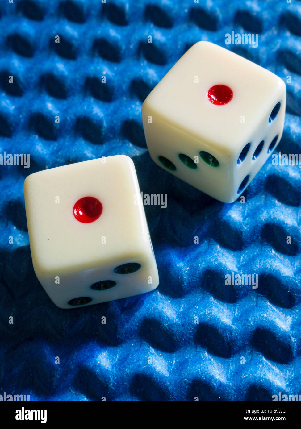 Snake Eyes Rolled Dice on Blue Textured Background Stock Photo Alamy