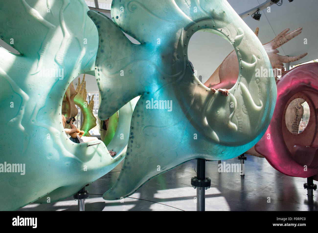 At the SeaGlass carousel in Manhattan's Battery Park, riders sit inside