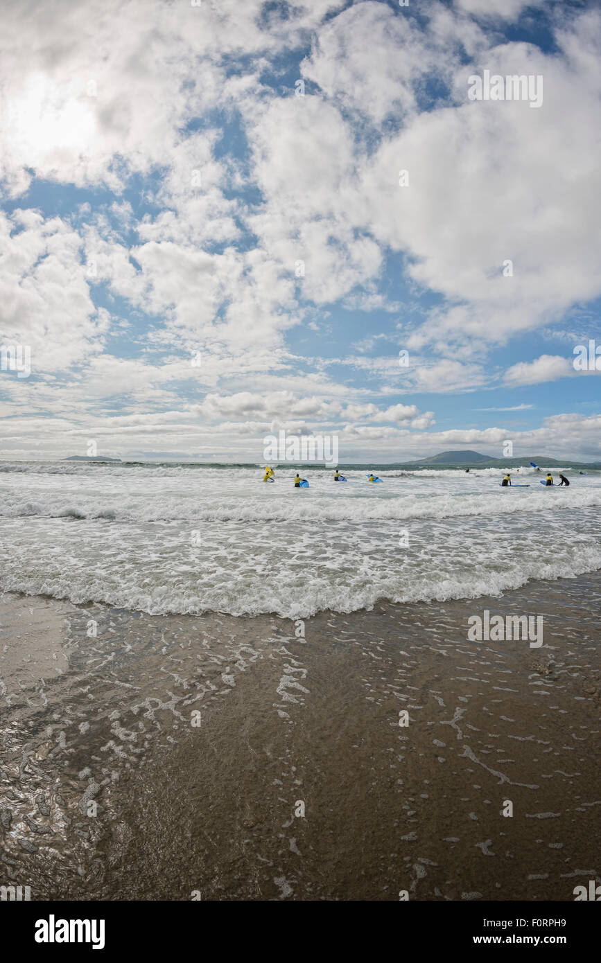 Surfers at Carrowniskey Strand beach, Louisburgh, Co. Mayo, Ireland Stock Photo