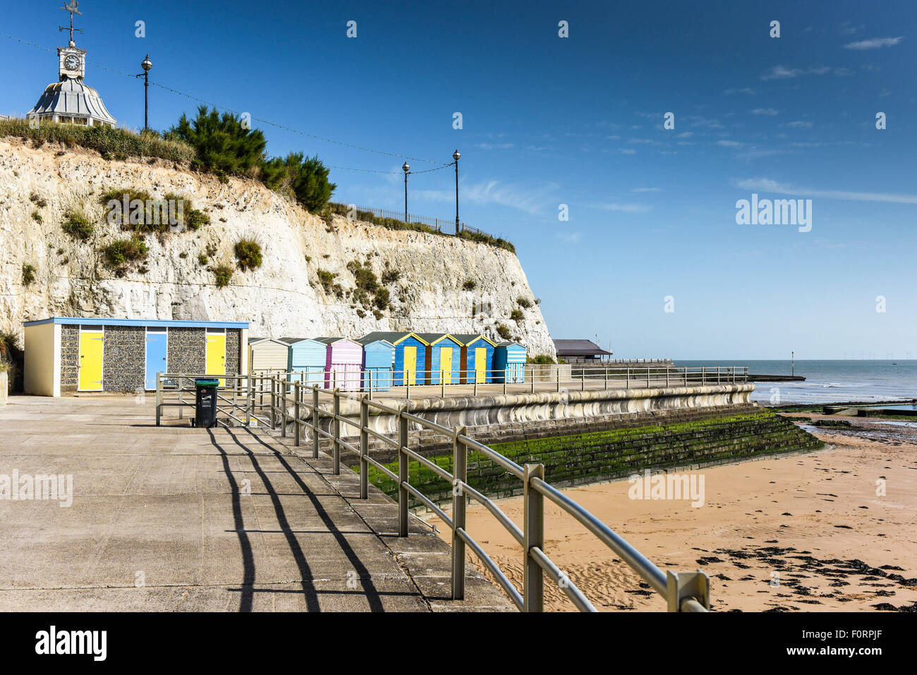 Beach huts on the promenade at Louisa Bay in Broadstairs, Kent Stock