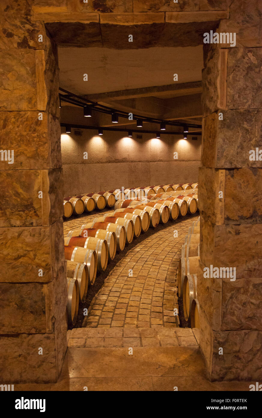 Oak barrel cellars inside Bodega Catena Zapata winery. Agrelo, Lujan de Cuyo. Mendoza. Argentina. Stock Photo