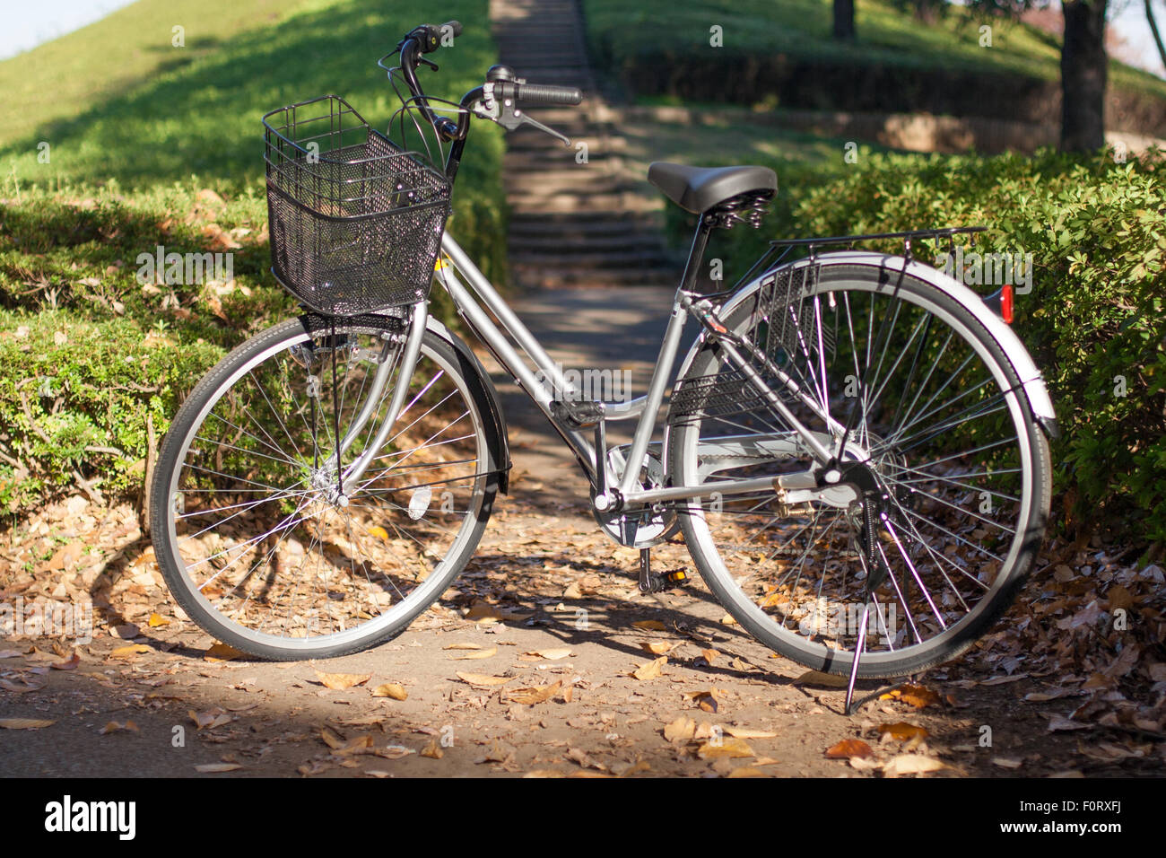 Japanese bike bicycle with front basket and back rack Stock Photo - Alamy