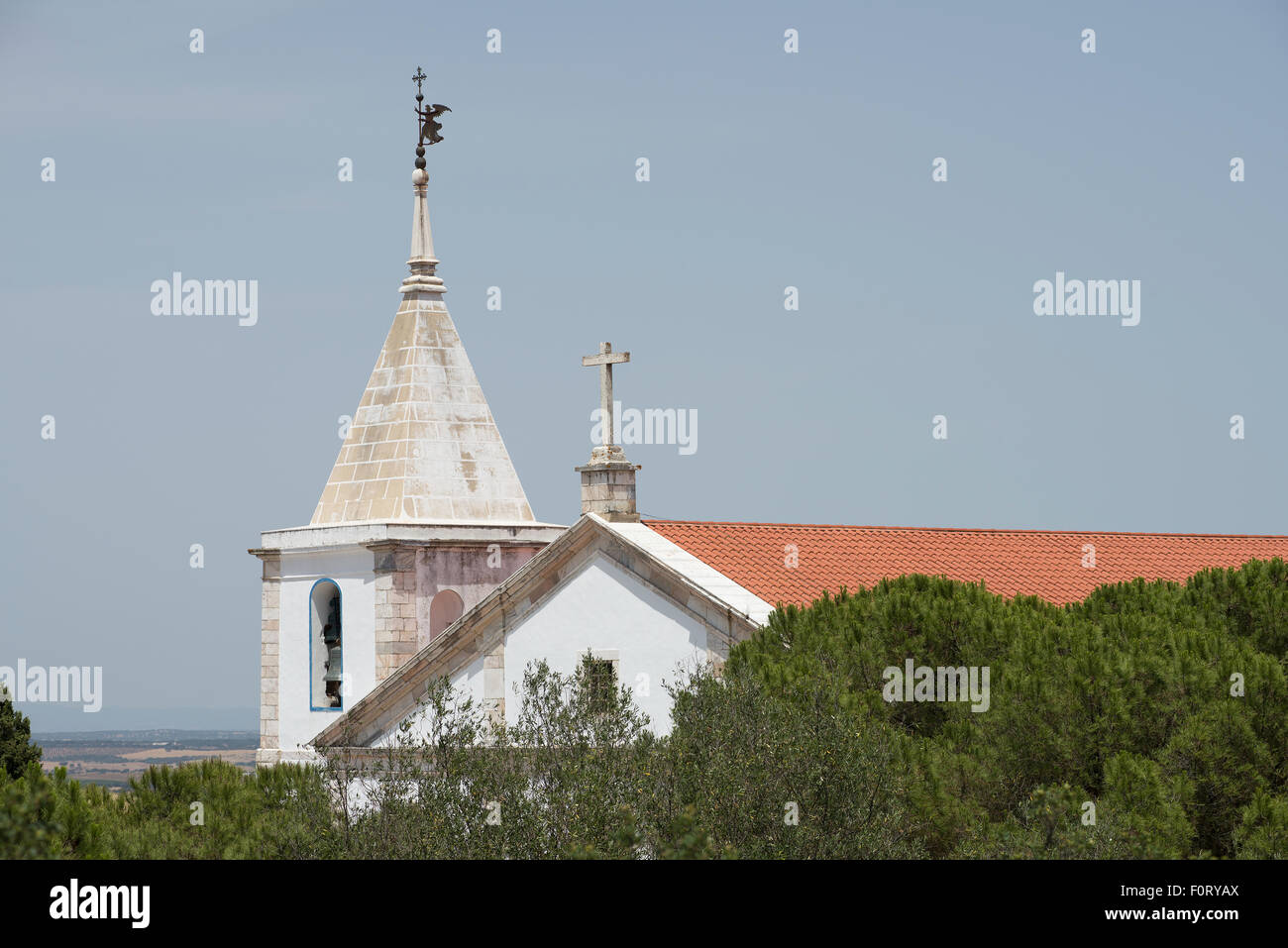 The steeple of the Church of Nossa Senhora da Conceição. Stock Photo