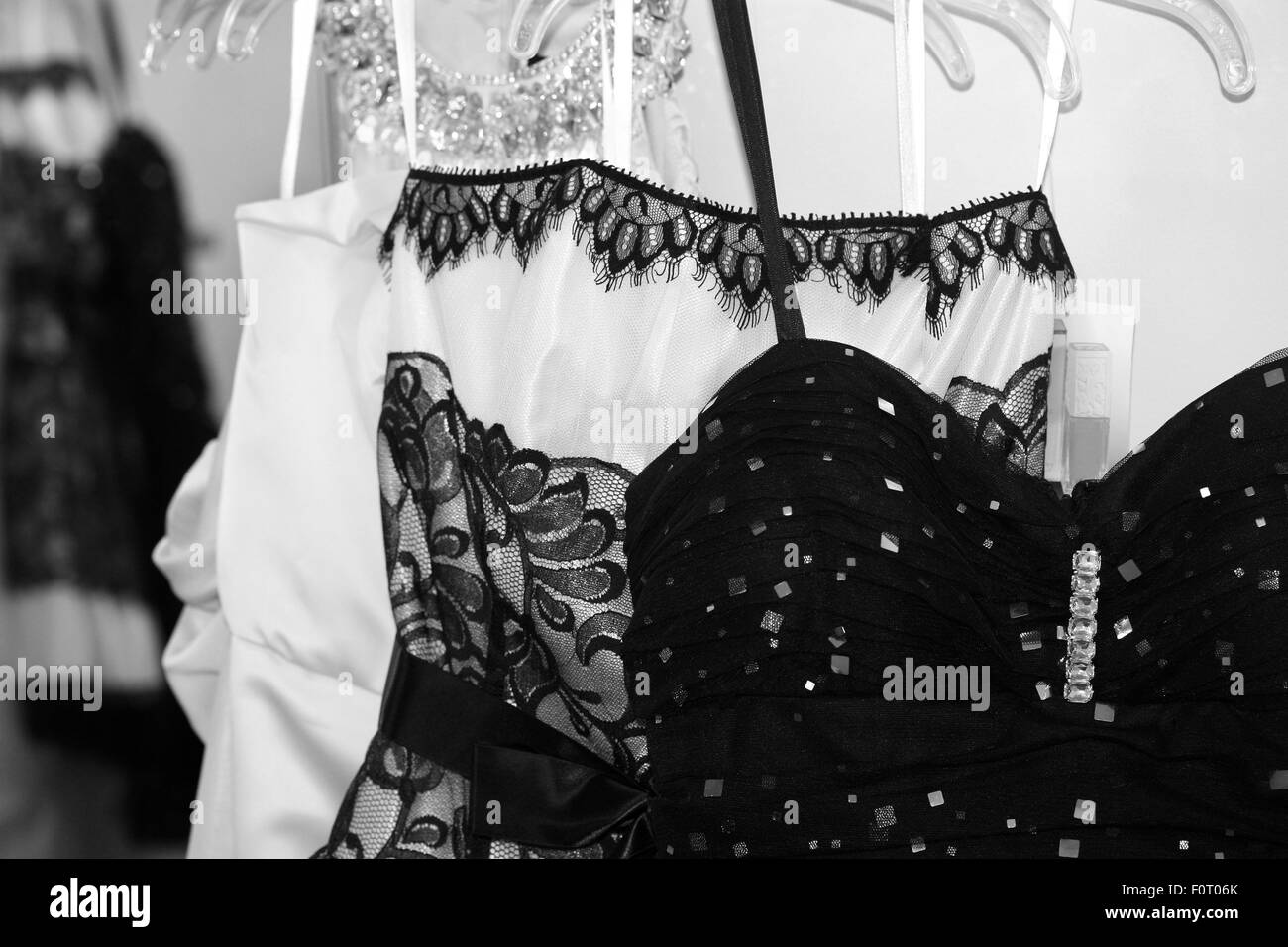 Apparel fitting Black and White Stock Photos & Images - Alamy