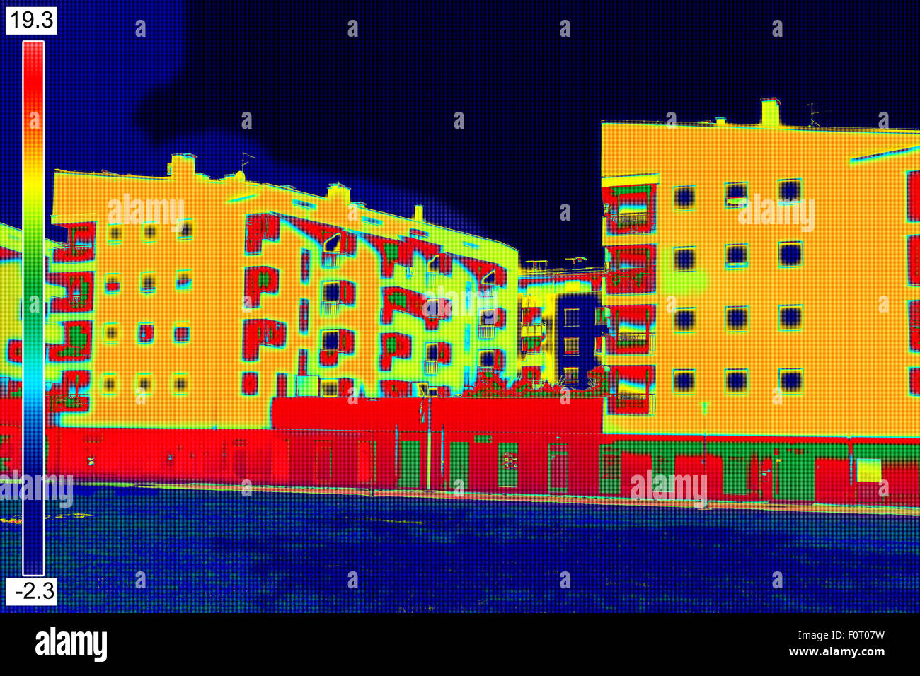 Infrared thermovision image showing lack of thermal insulation on Residential building Stock Photo