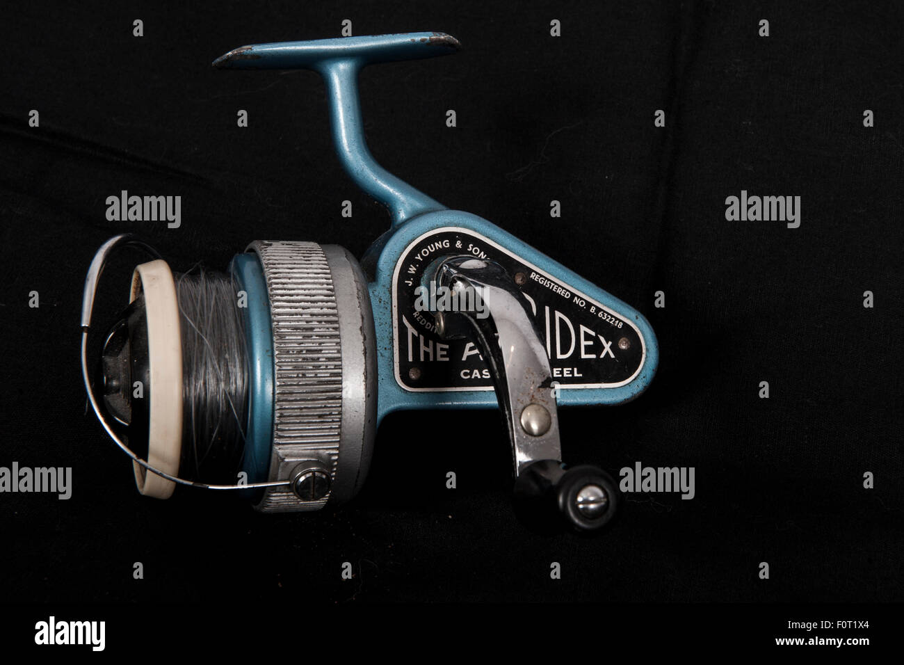 A vintage fishing reel, the Ambidex from J.W. Young on a black background  Stock Photo - Alamy