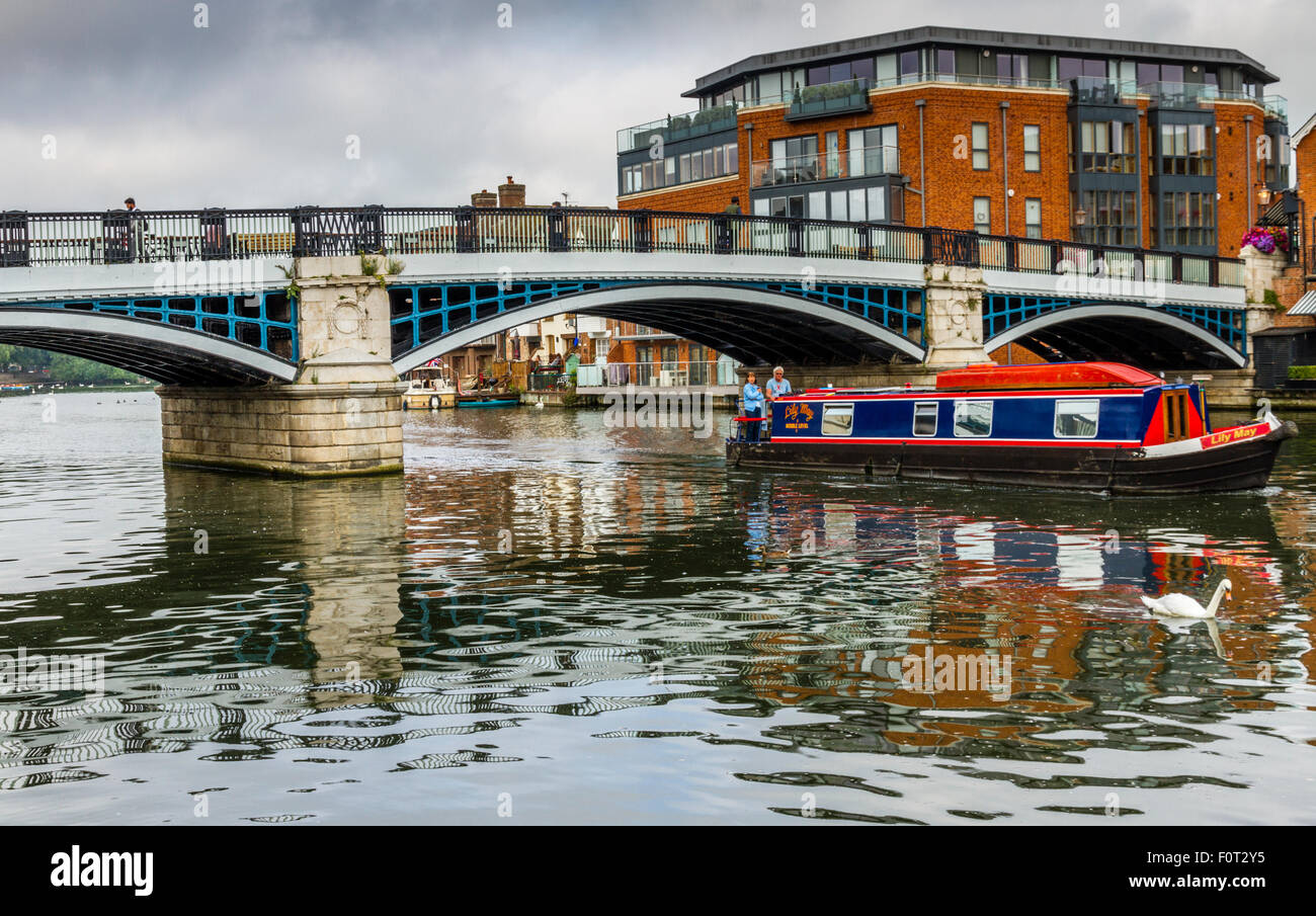 A narrowboat pictured on river Thames in Windsor, Berkshire. Stock Photo