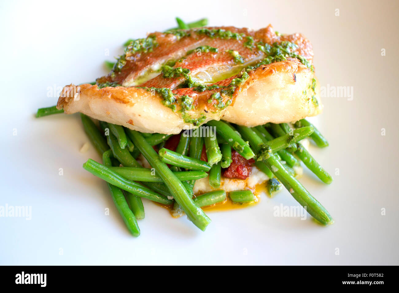Red snapper fish and green beans Stock Photo Alamy