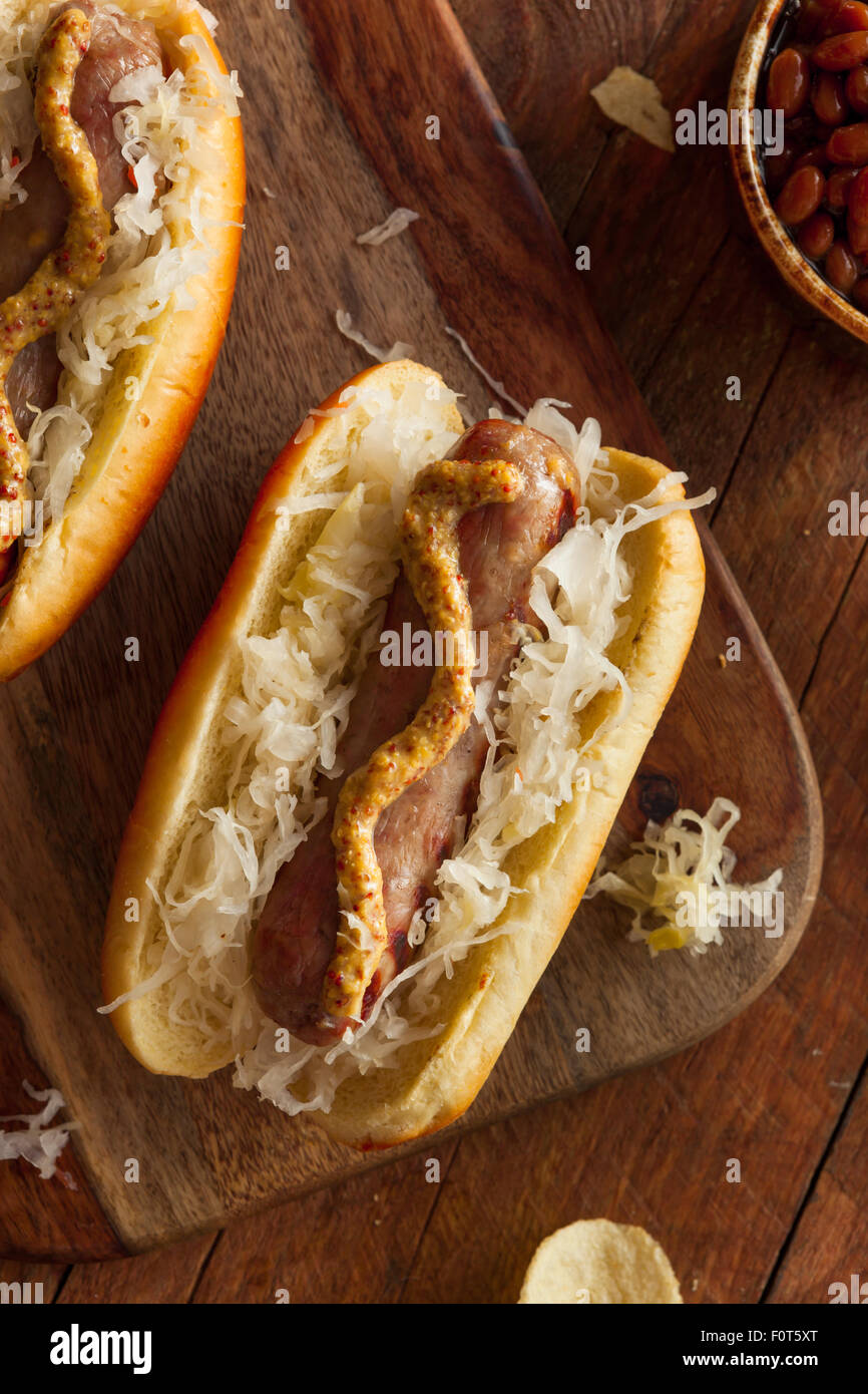 Beer Bratwurst with Sauerkraut and Spicy Mustard Stock Photo