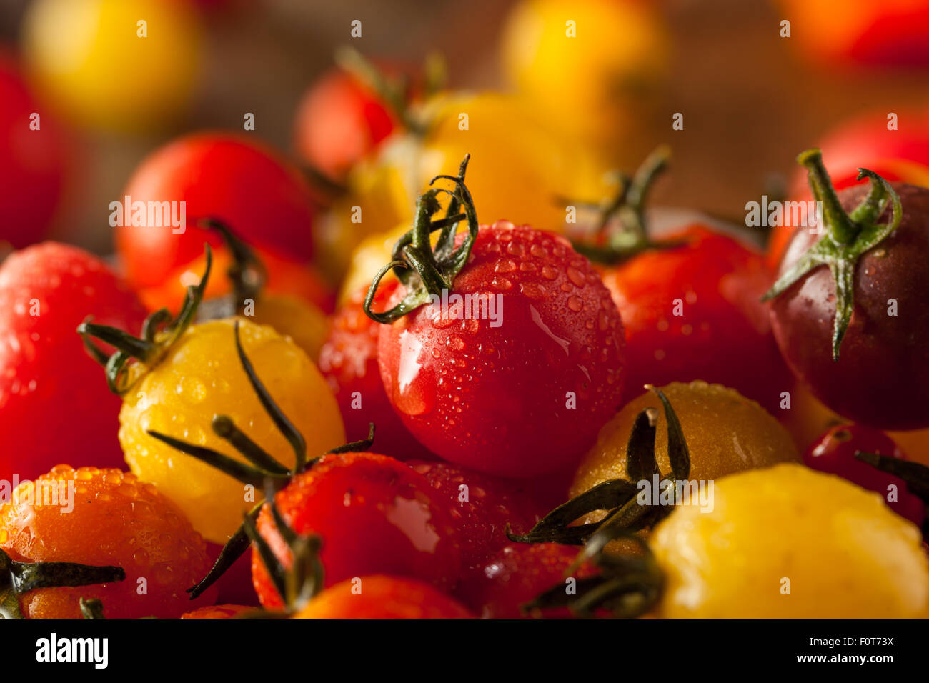 Organic Heirloom Cherry Tomatos in a Bowl Stock Photo - Alamy