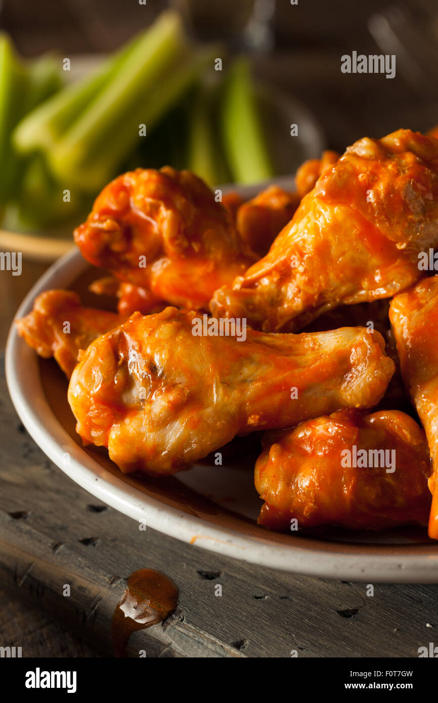 Spicy Homemade Buffalo Wings with Dip and Beer Stock Photo