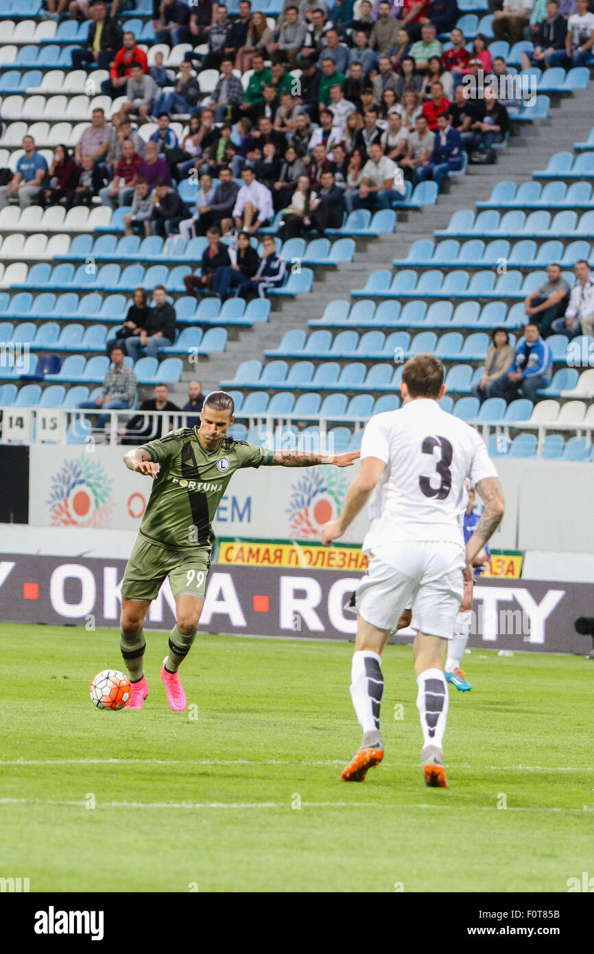 Kiev, Ukraine. 20th Aug, 2015. Mikhail Sivakov (R) of Zorya Luhansk vies for the ball with Aleksandar Prijovic (L) of Legia during the match. Zorya Luhansk lost the game with FC Legia Warsaw during the UEFA Europa League play-offs, first leg soccer match at the Dynamo Stadium in Kiev. Credit:  Sergii Kharchenko/Pacific Press/Alamy Live News Stock Photo