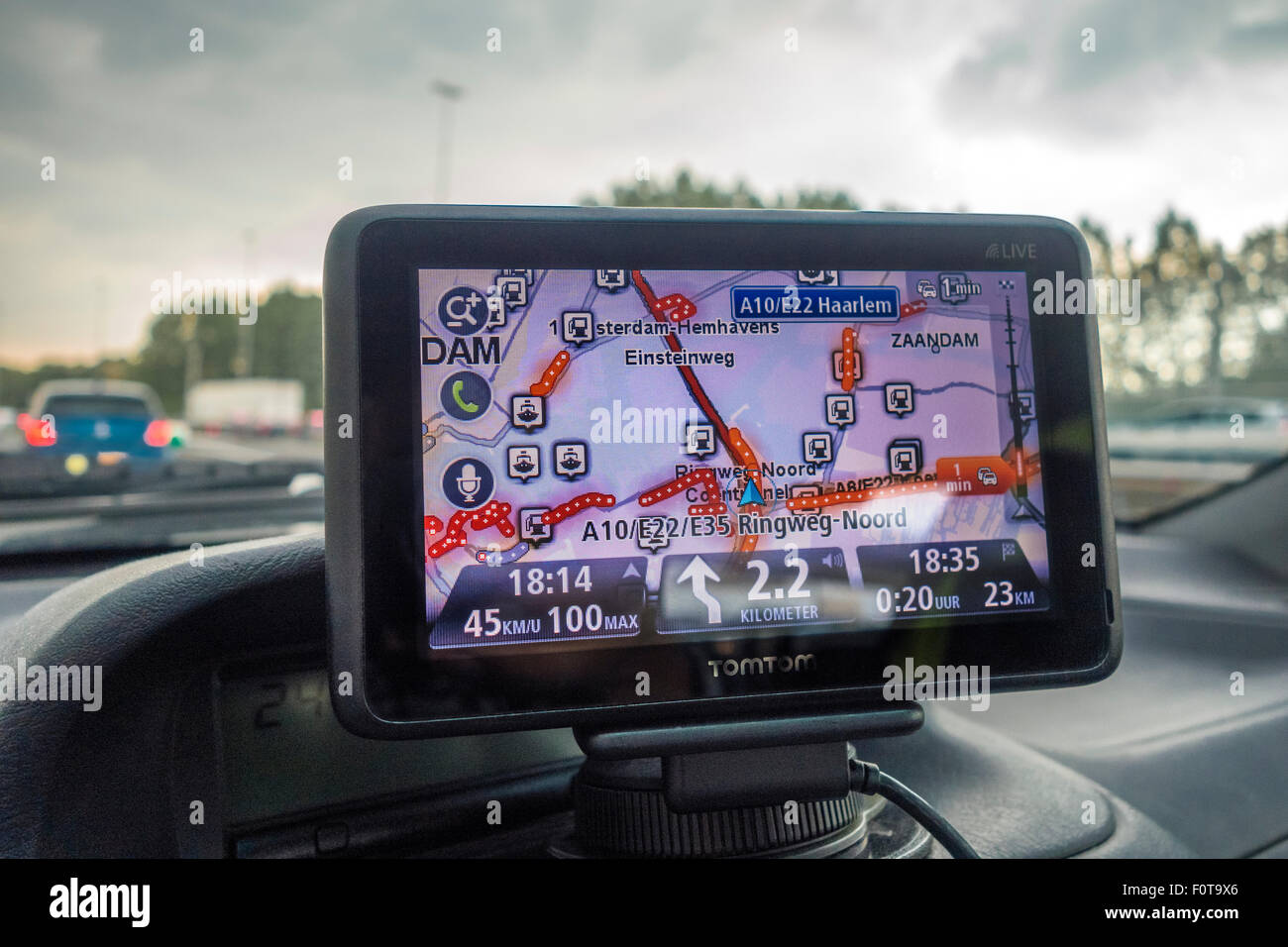 TomTom sat nav, TomTom satnav, satellite navigation showing live traffic information heavy congestion and a way out of traffic jam in Amsterdam Stock Photo