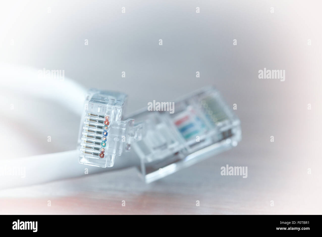 close up of RJ45 Plug Network on wood desk Stock Photo - Alamy