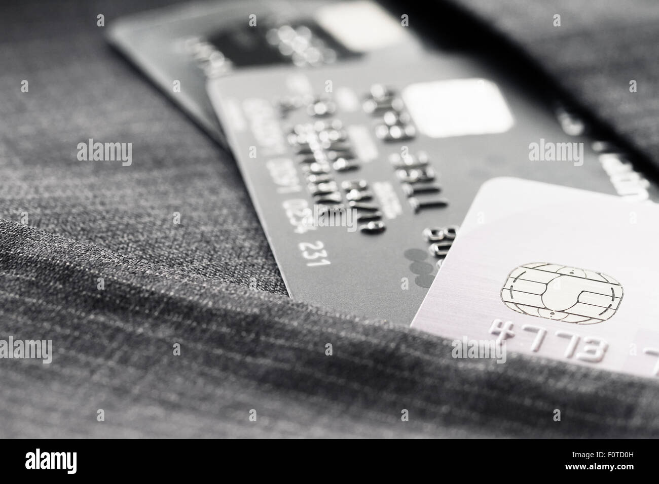 Credit Cards In Very Shallow Focus With Gray Suit Background Stock Photo Alamy