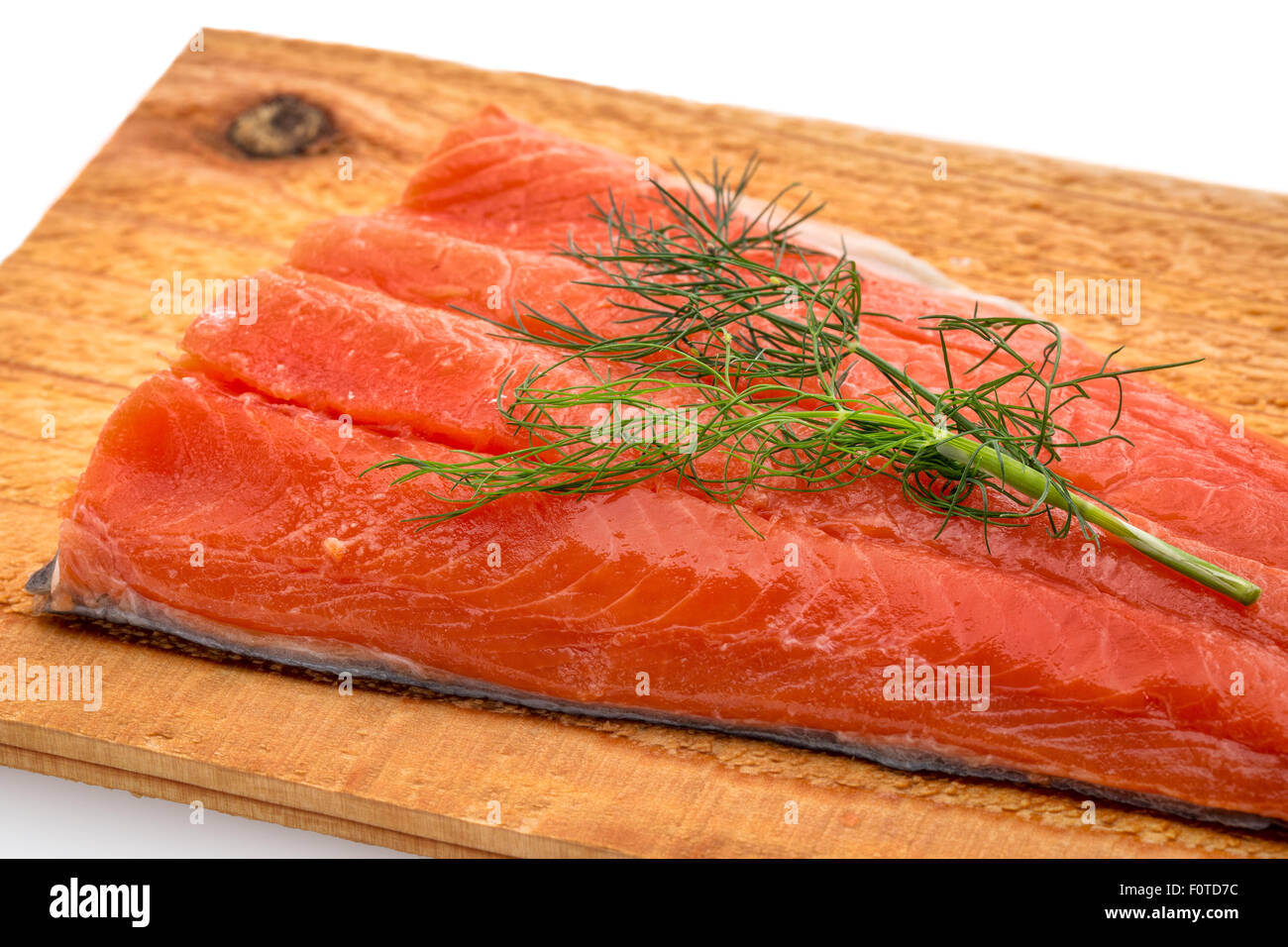 a portion of sockeye salmon prepared for grilling on a water soaked