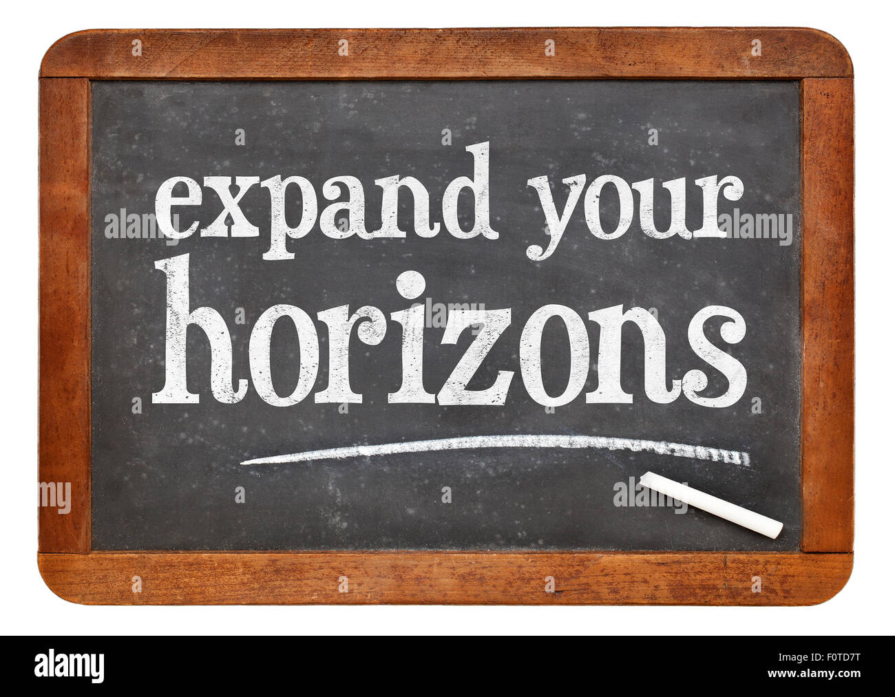 Expand your horizons motivational text on a vintage slate blackboard