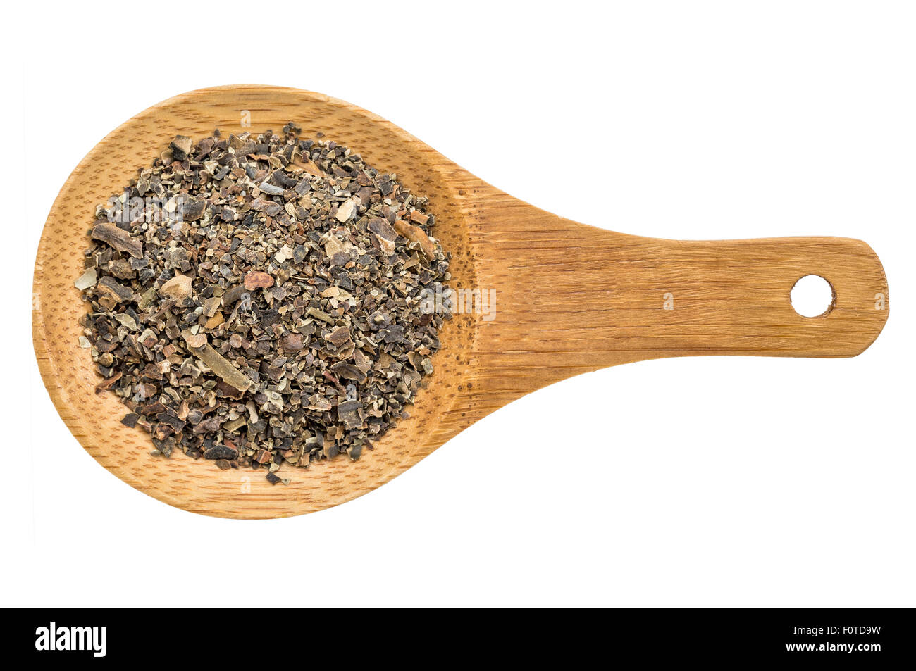 bladderwrack  seaweed flakes - top view of a wooden spoon isolated on white Stock Photo