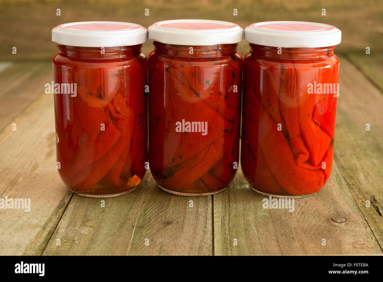 red peppers in a glass jar Stock Photo Alamy