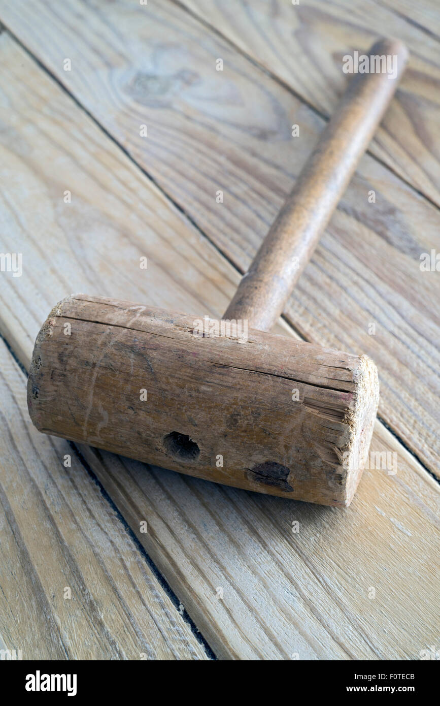 Hammer made of wood, carpentry tool. Stock Photo