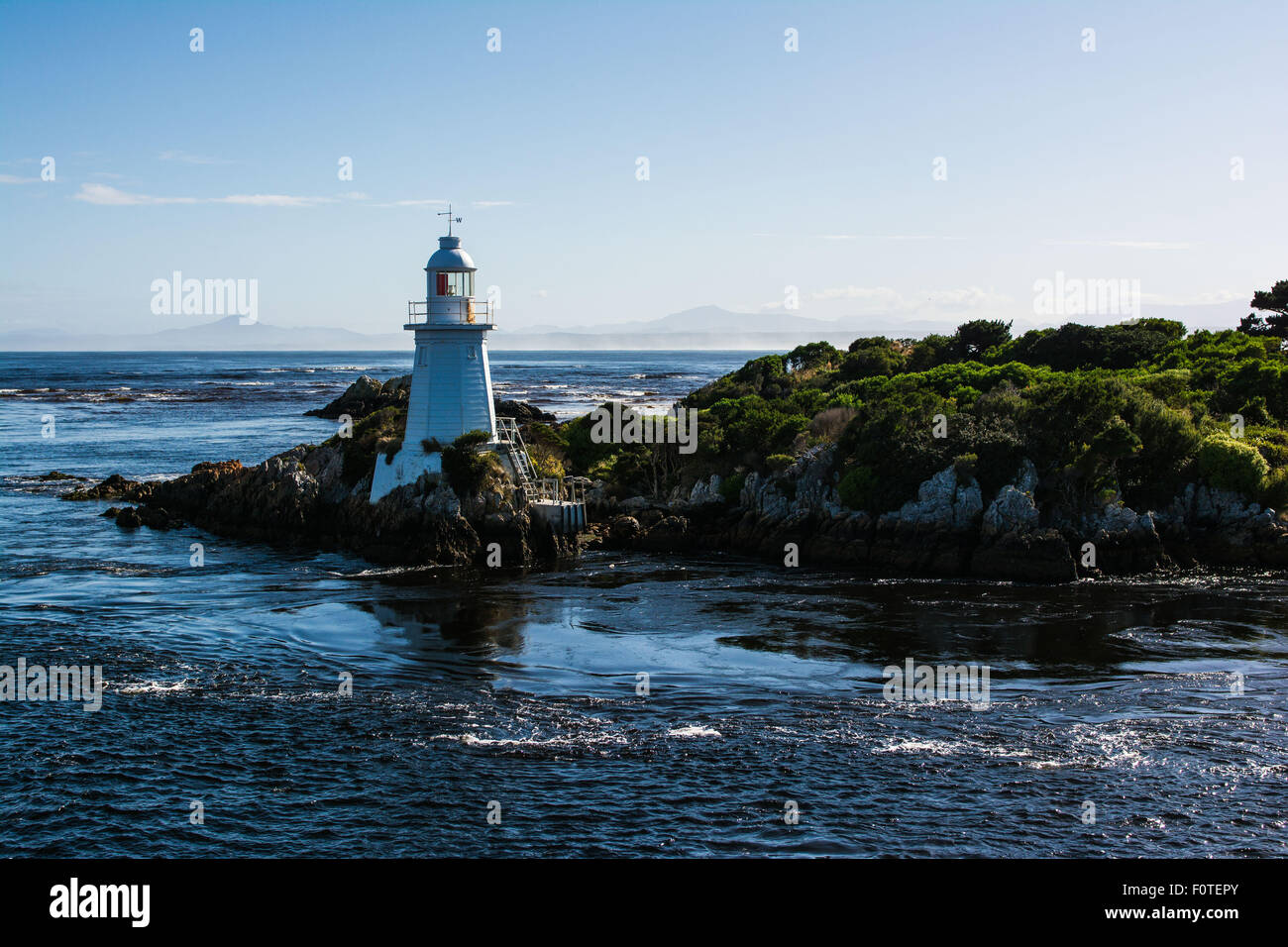 Lighthouse on Entrance Island, Hells Gate, Macquarie Harbor, Tasmania, Australia Stock Photo