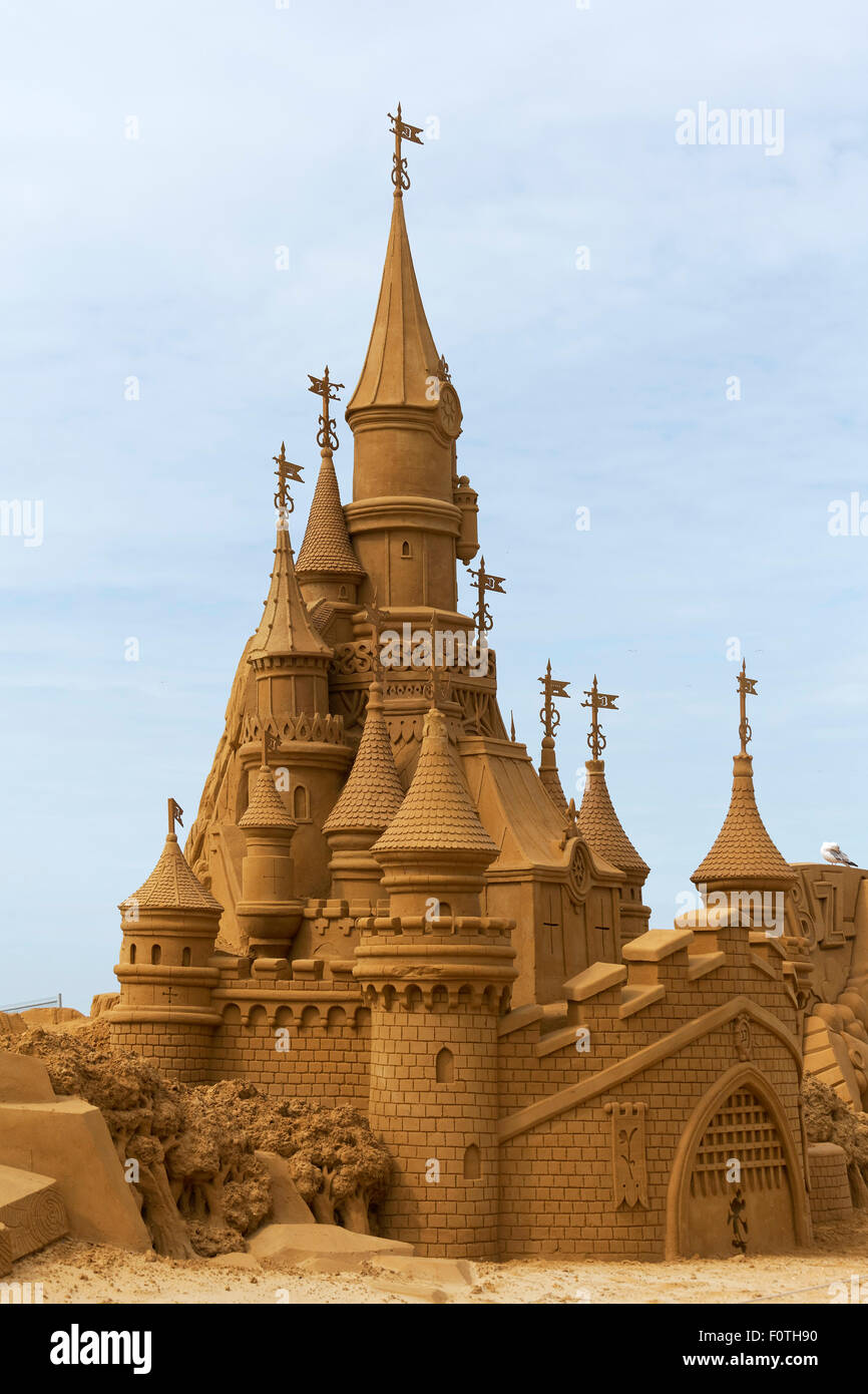 Walt Disney fairytale castle made of sand, sand sculptures festival Frozen Summer Sun, Oostende, West Flanders, Belgium Stock Photo
