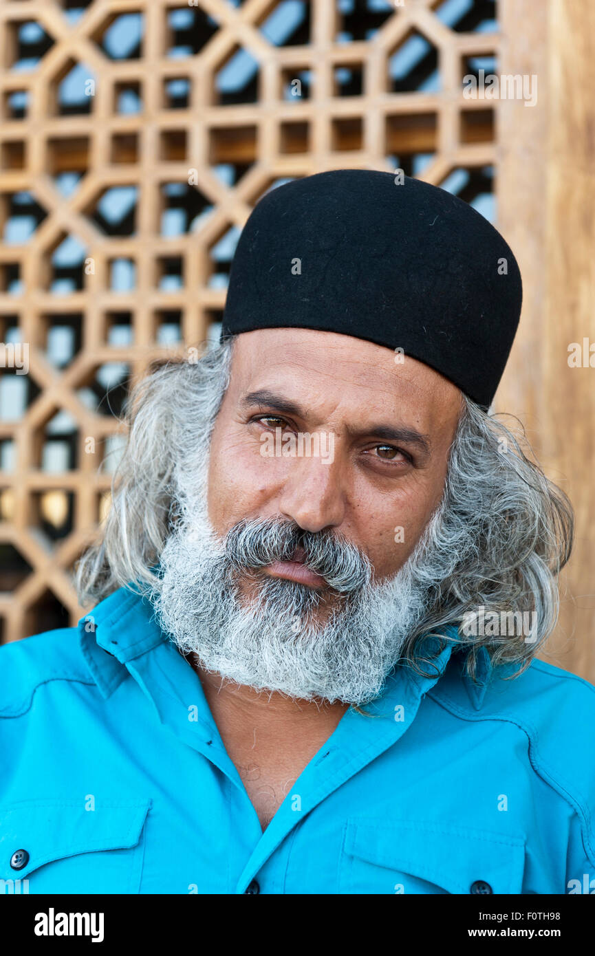 Portrait, Persian, Iranian man with round hat, Isfahan, Iran Stock Photo