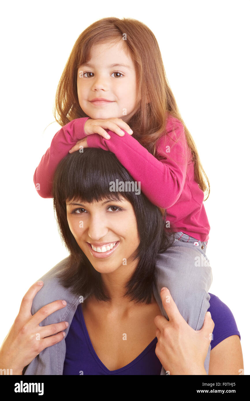 Mother carrying her daughter on her shoulders Stock Photo Alamy