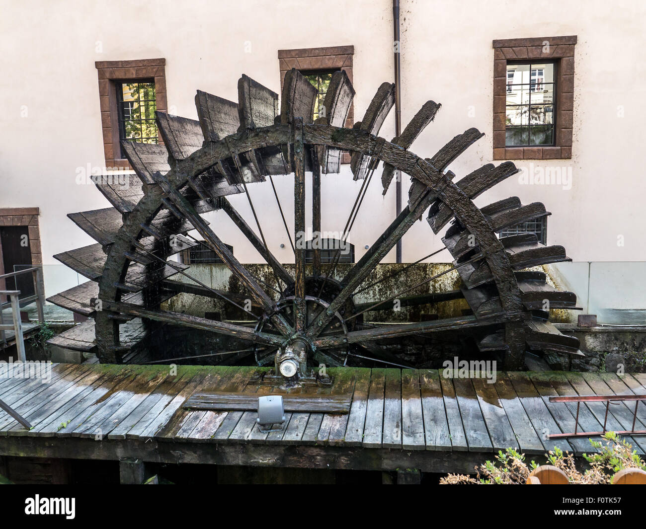 Old wooden watermill wheel Stock Photo