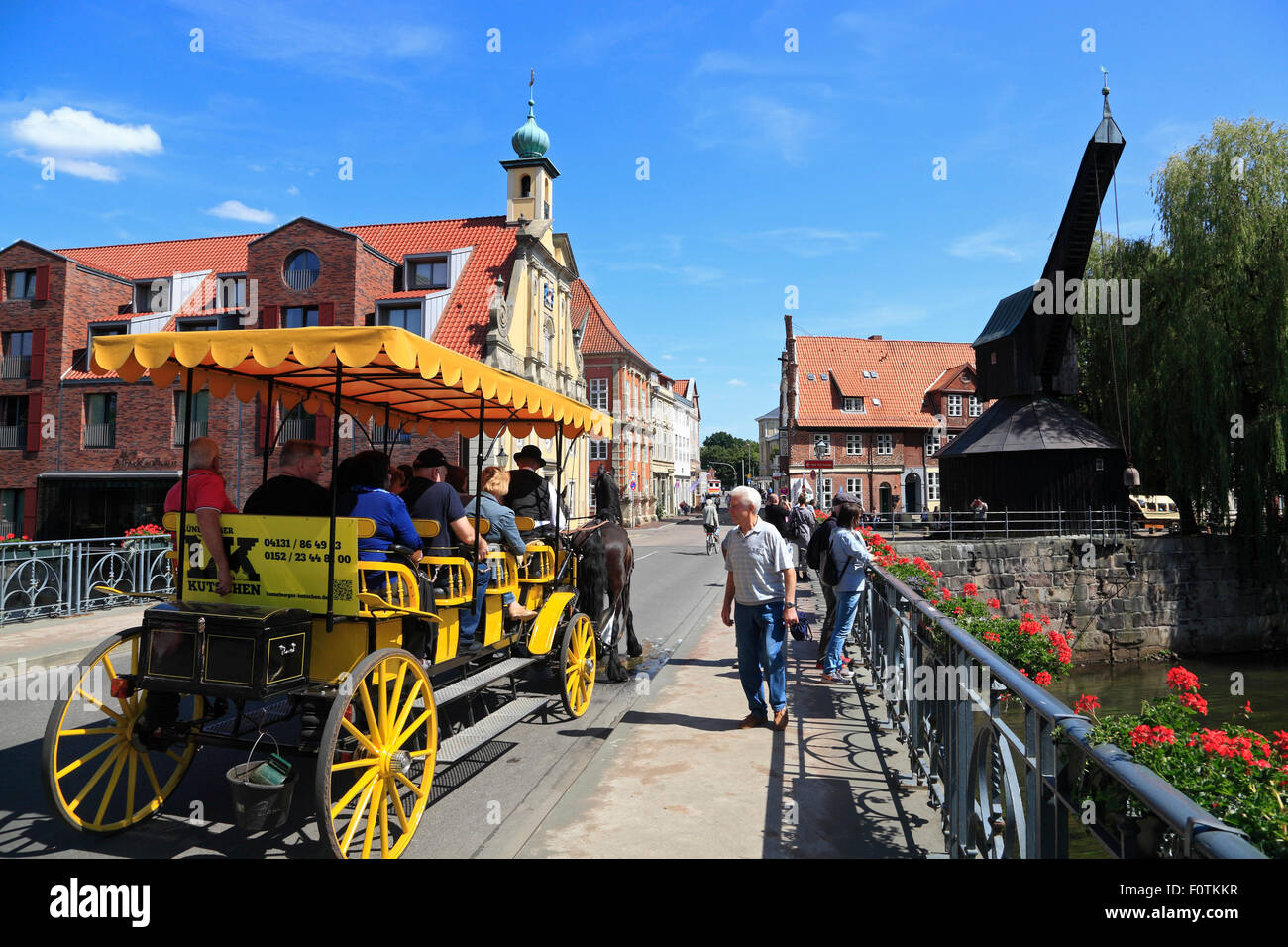 Sightseeing tour by carriage, old harbour quarter, Lueneburg, Lüneburg, Lower Saxony, Germany, Europe Stock Photo