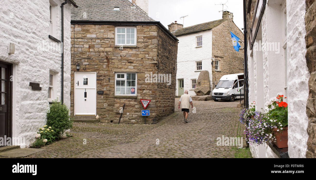 The cobbled centre of Dent, a village dating back to Viking times, Yorkshire Dales National Park, Cumbria, England, UK Stock Photo