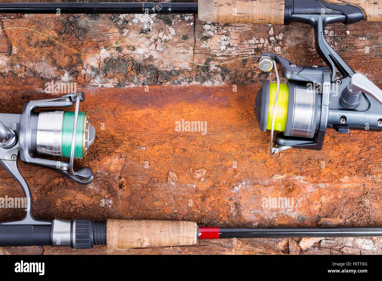 fishing rod and reel with line on natural background for frame