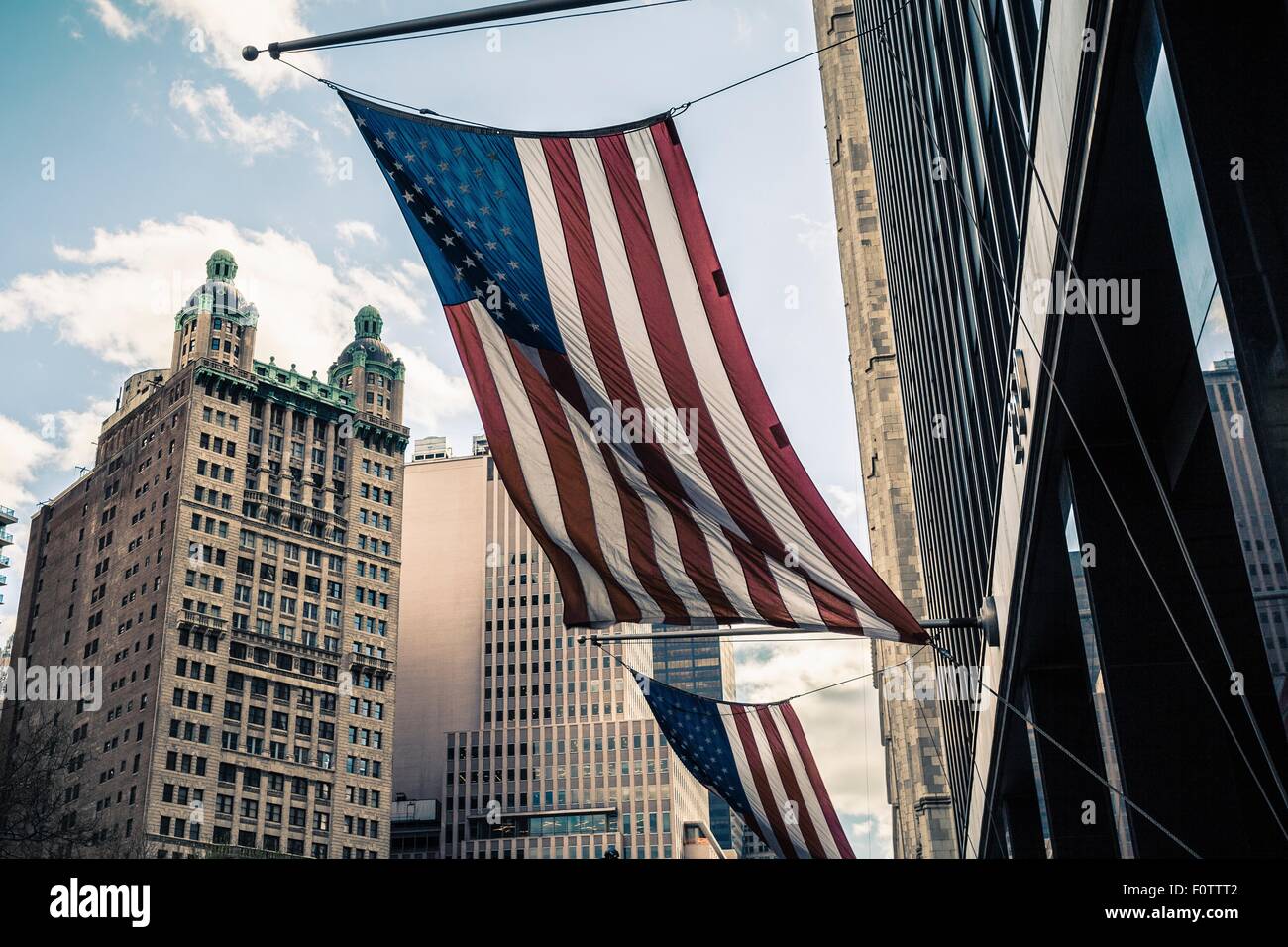 View of buildings and American flags, Manhattan, New York, USA Stock Photo