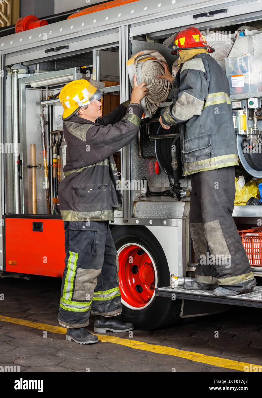 Man removing helmet hi-res stock photography and images - Alamy