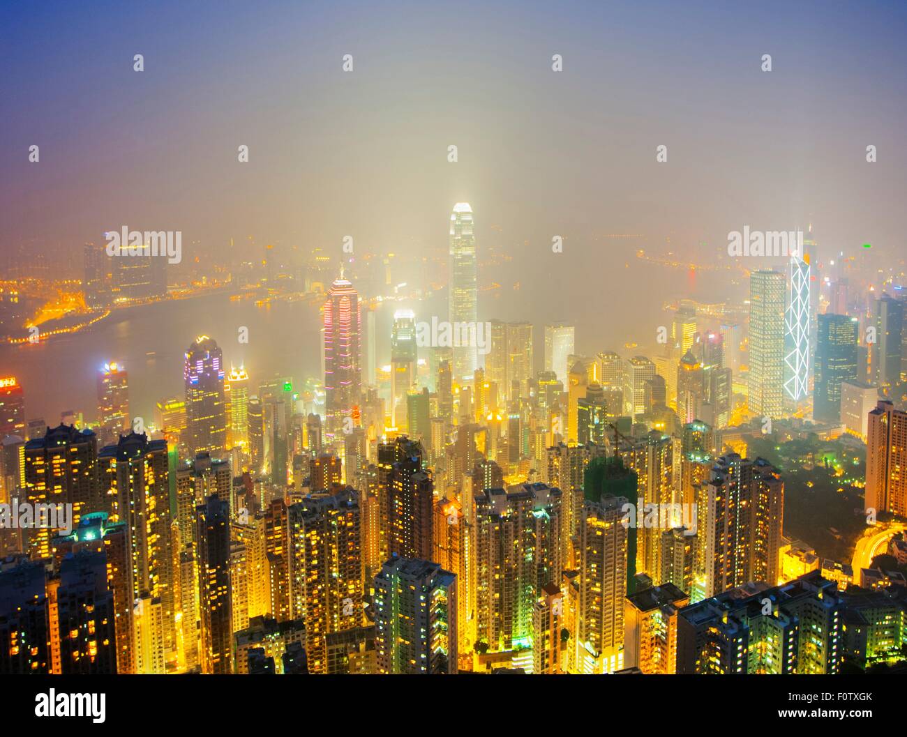 Skyscrapers in Hong Kong at night, China Stock Photo