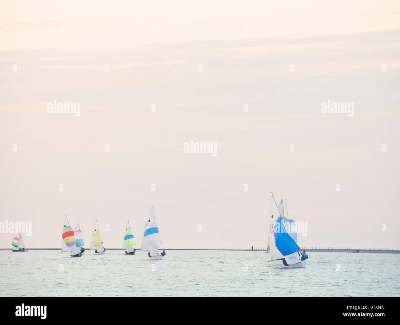 Group of sailboats sailing on sea, West Kirby, Wirral, Uk Stock Photo