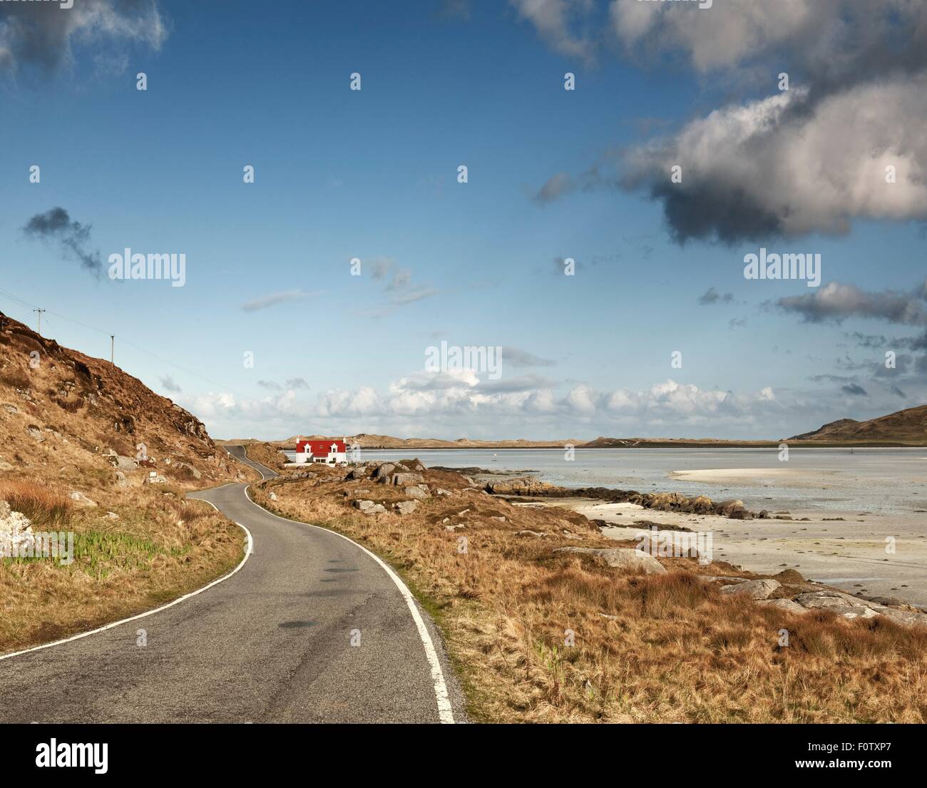 Winding coastal road, Isle of Barra, Hebrides, Scotland, UK Stock Photo