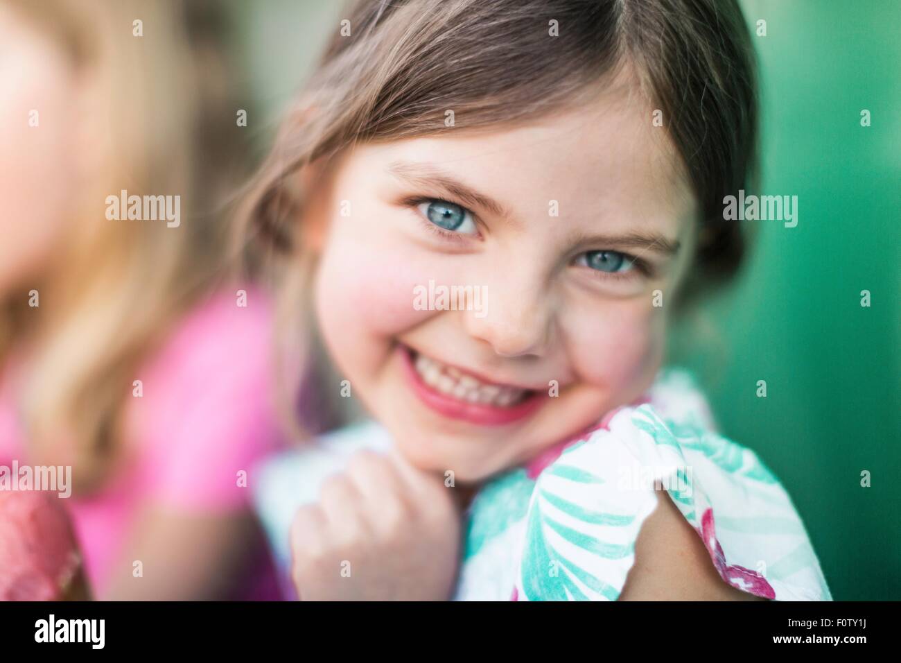 Young girl smiling at the camera Stock Photo - Alamy