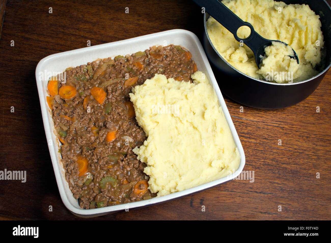The layer of mashed potato going on the top of a shepherd's pie Stock Photo