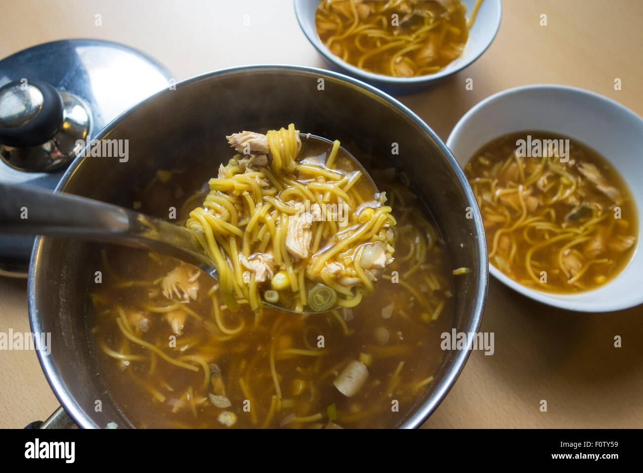 Home-made chicken noodle soup Stock Photo