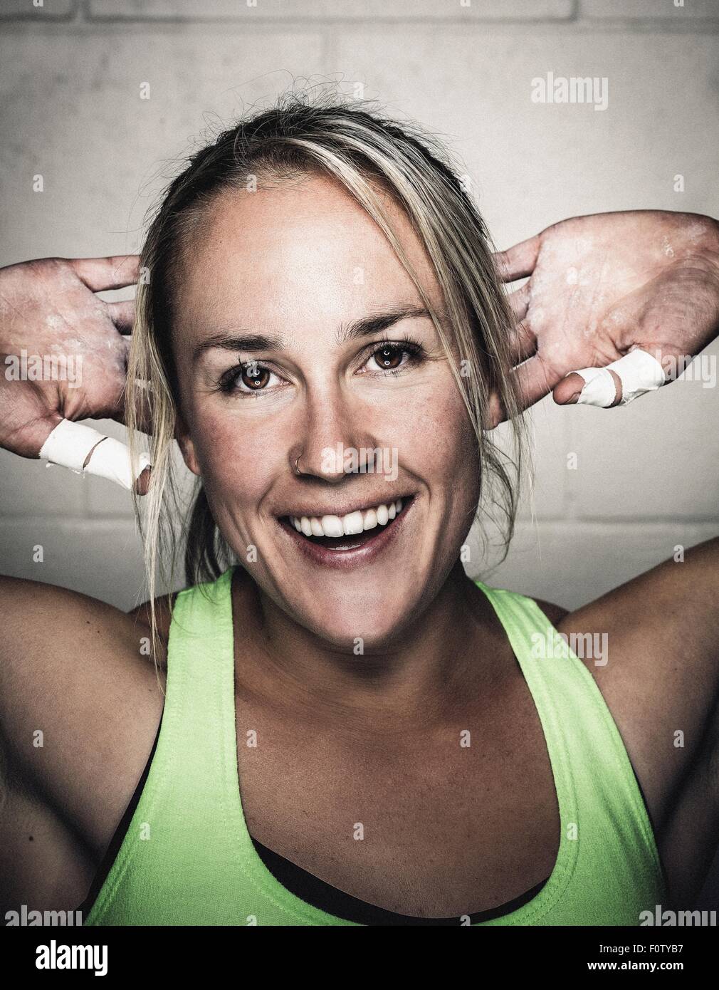 Portrait of smiling mid adult woman before workout Stock Photo