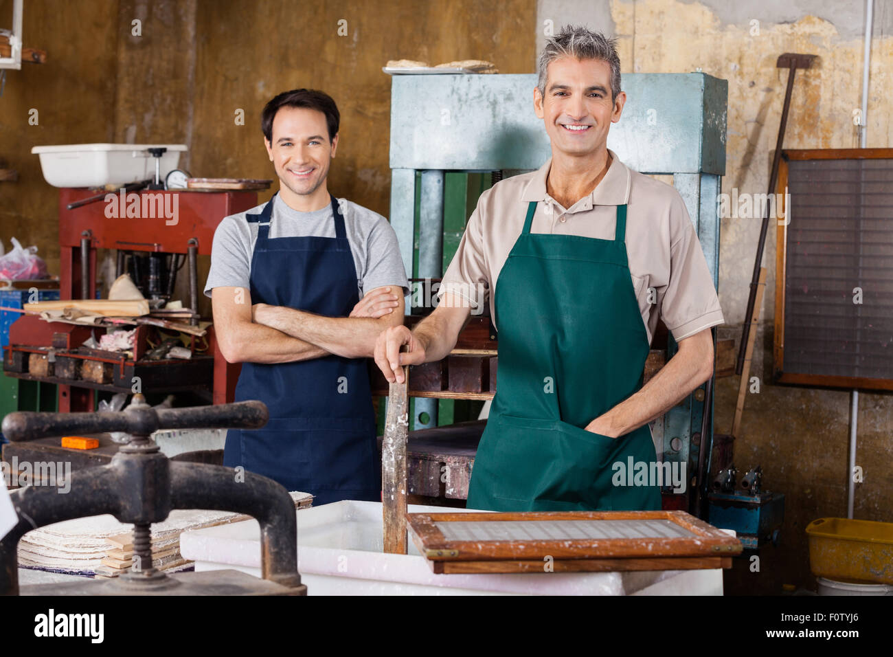 Confident Workers Standing In Paper Factory Stock Photo Alamy