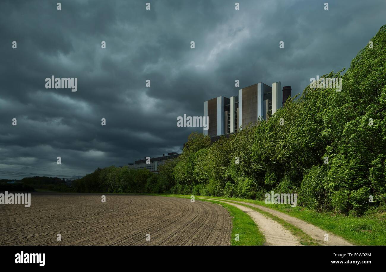 View of brown coal fired power station and storm clouds, Eschweiler, Nordrhein-Westfalen, Germany Stock Photo