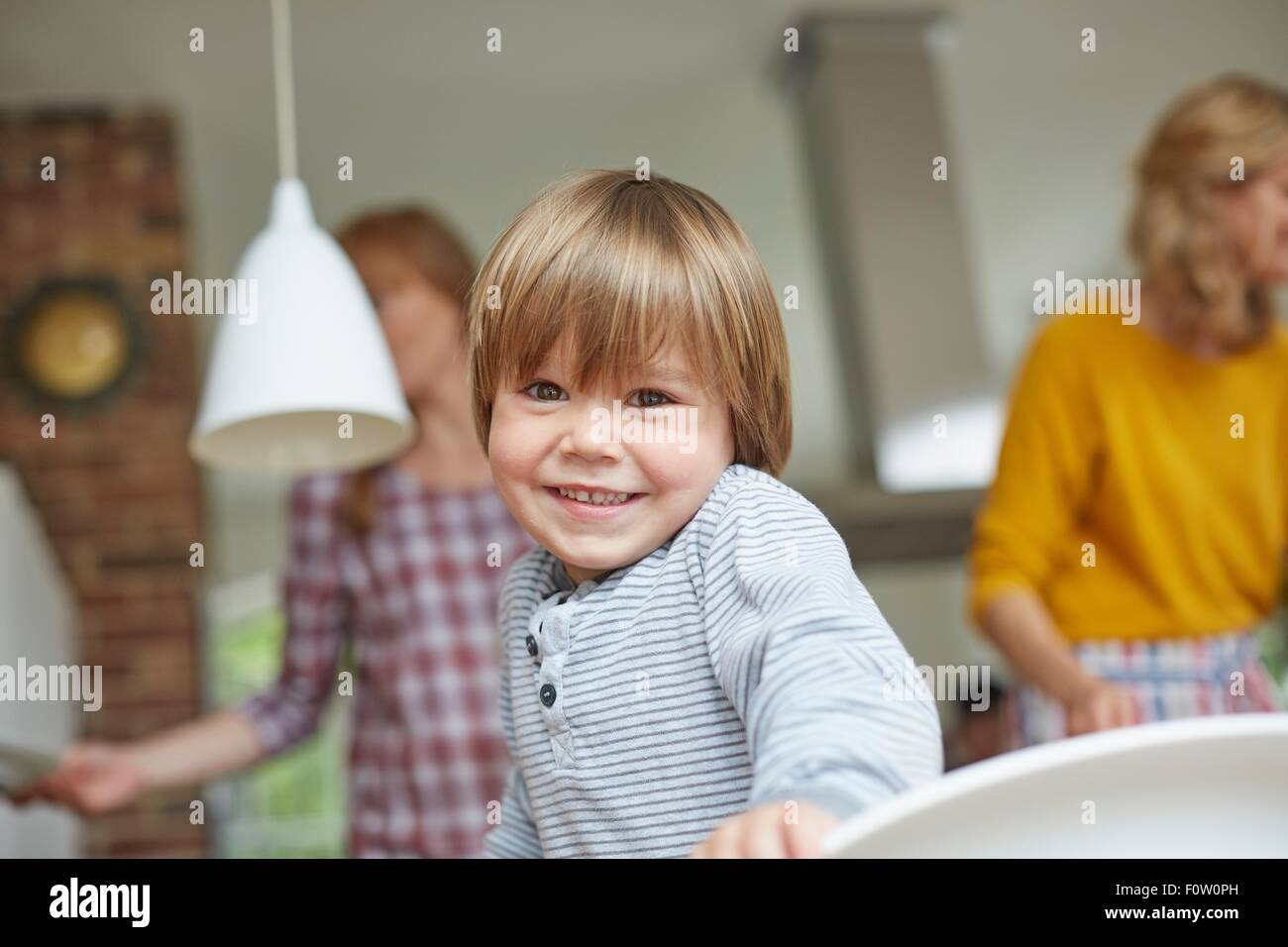 Portrait of boy looking at camera smiling Stock Photo - Alamy