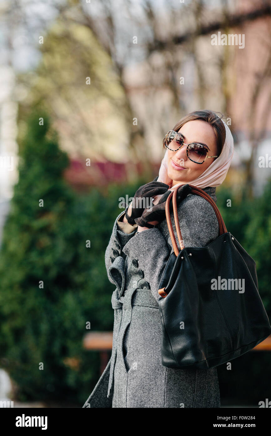Happy young beautiful girl posing in the park Stock Photo - Alamy