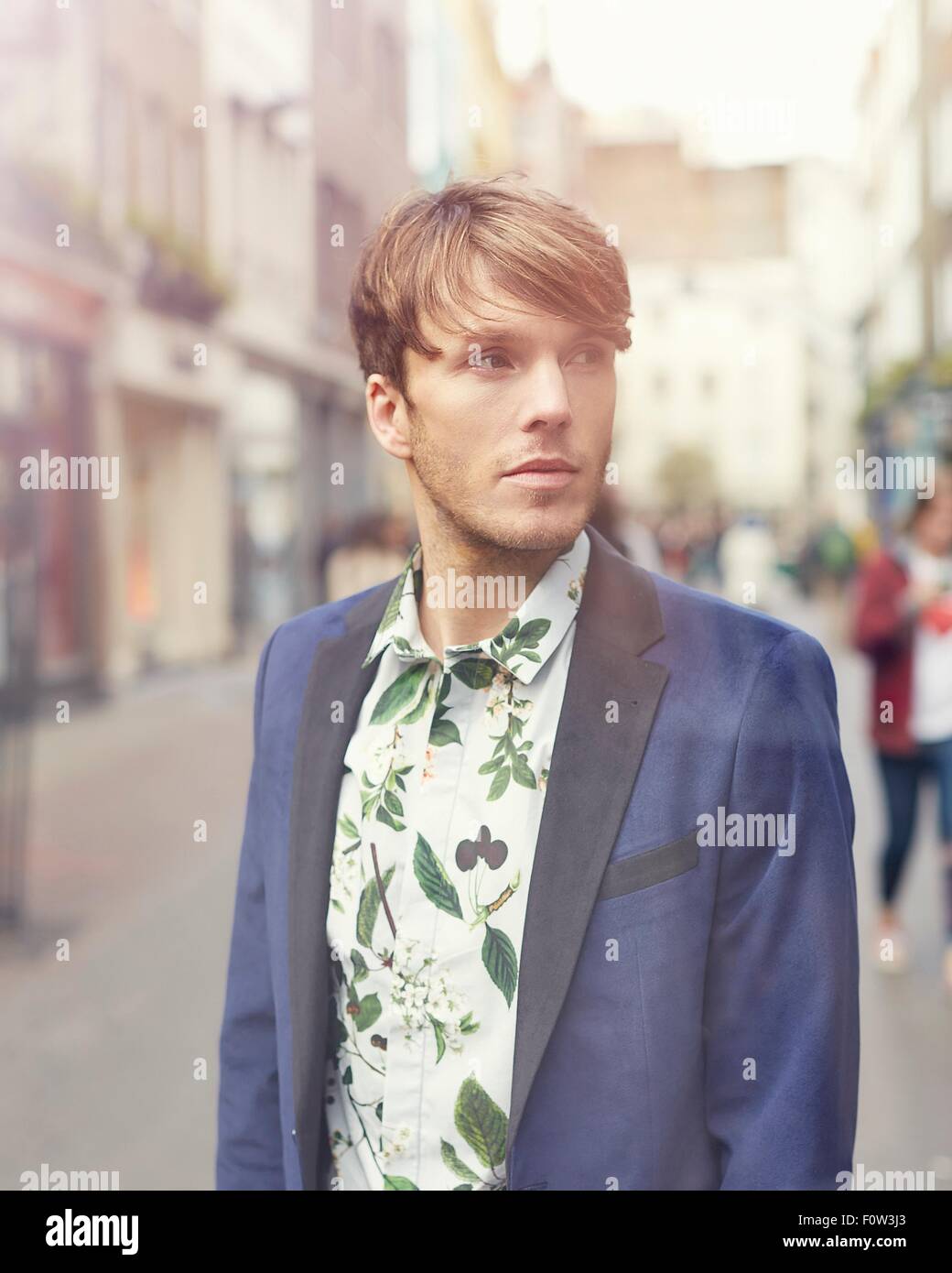 Portrait of stylish mid adult man on street, London, UK Stock Photo