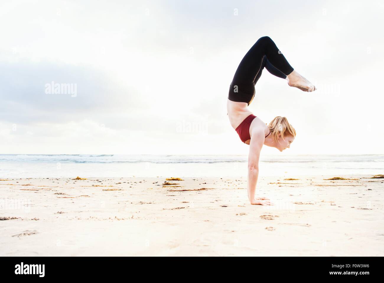 people doing handstands