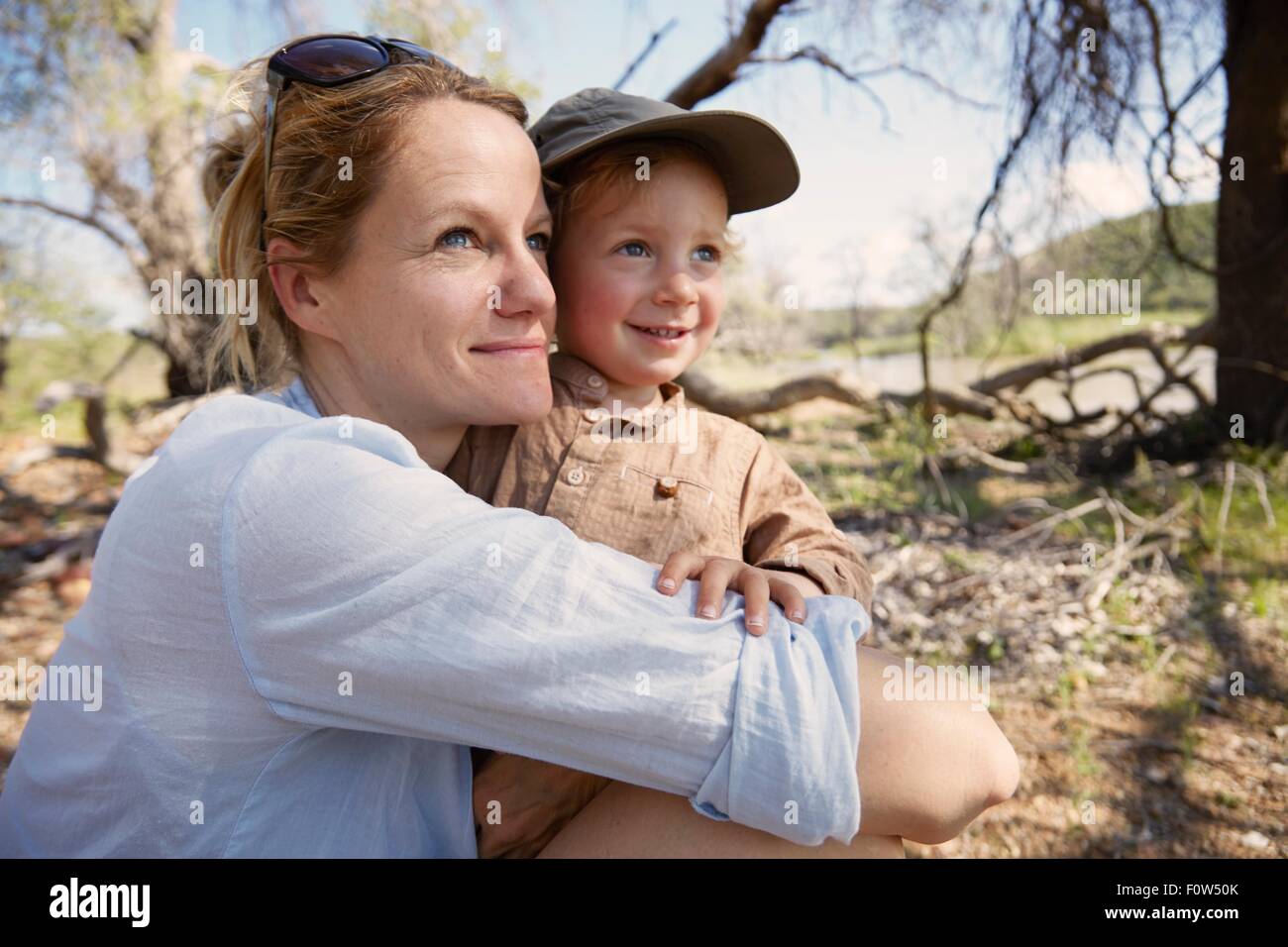 Mother and son looking at view, Ruacana, Owamboland, Namibia Stock Photo