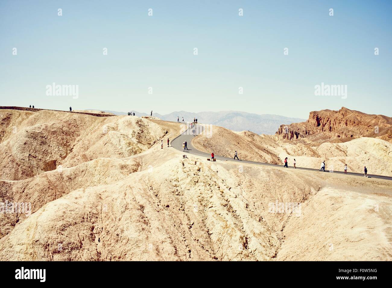 View of tourists on winding road, Zabriskie Point, Death Valley, California, USA Stock Photo