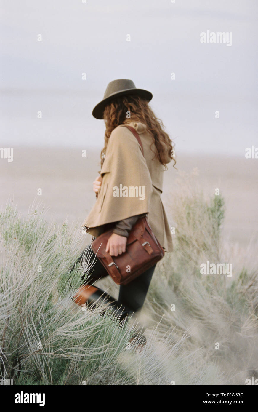 Woman hat walking through hi-res stock photography and images - Alamy